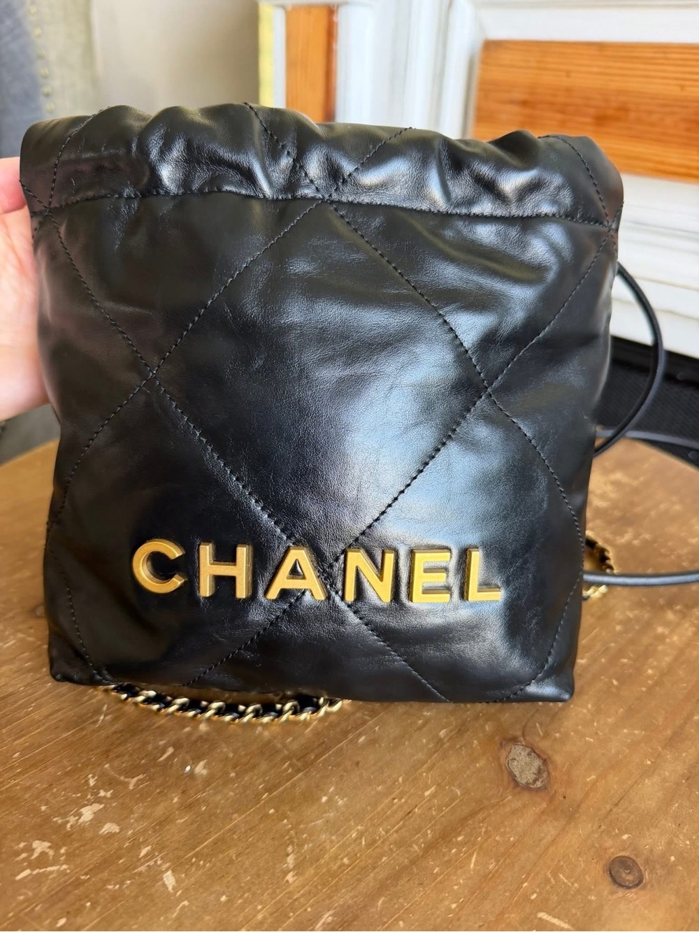 CHANEL Black Quilted Leather Mini Drawstring Bag with Gold Hardware - Picture 2 of 9